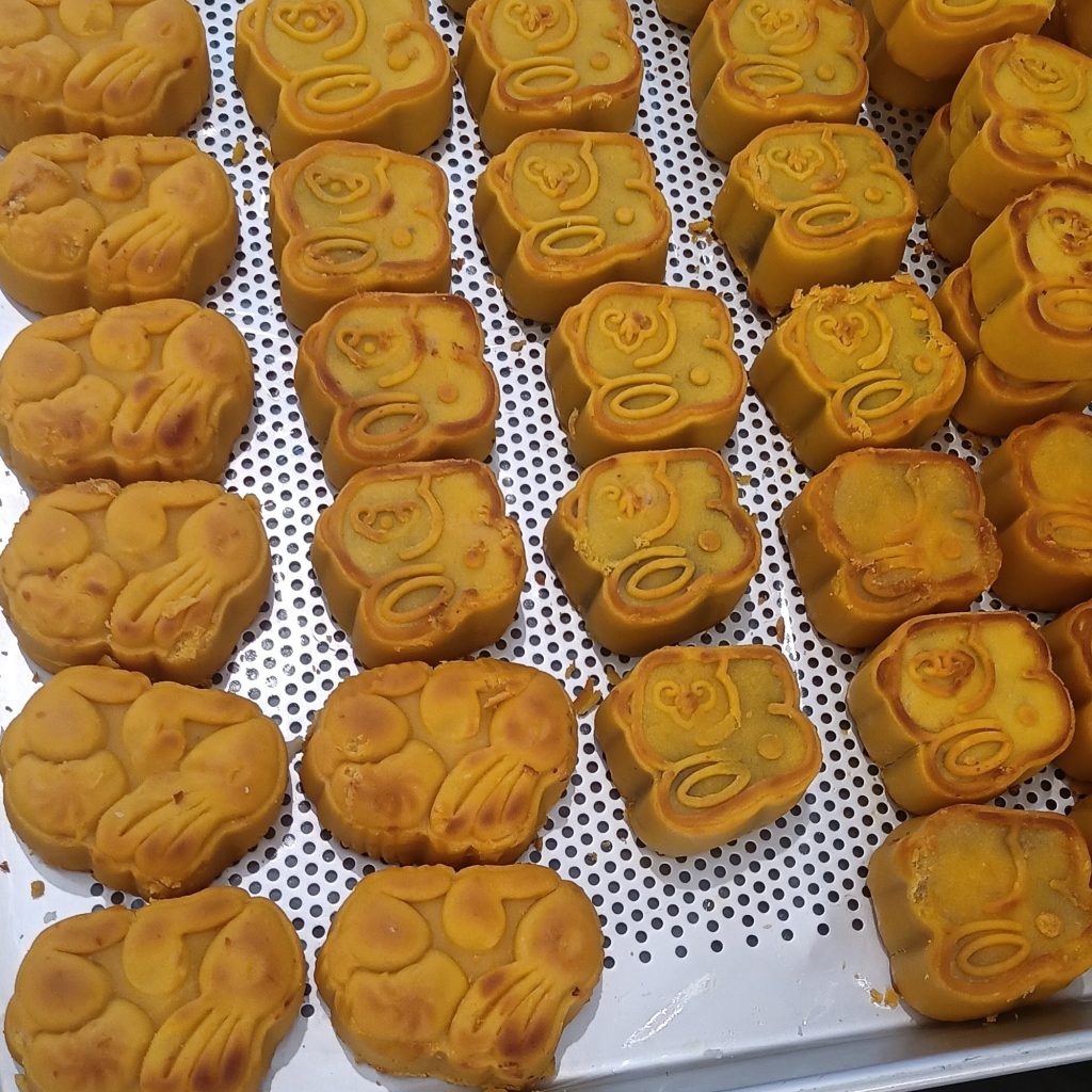 Jade rabbit stamped Chinese mooncakes on a plate