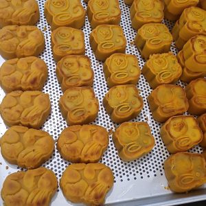 Jade rabbit stamped Chinese mooncakes on a plate