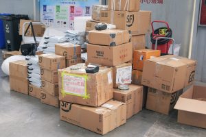 Stacked SF Express packages ready for delivery in China