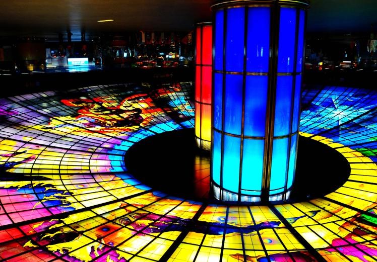 Blue and red illuminated pillars under Kaohsiung Dome of Light
