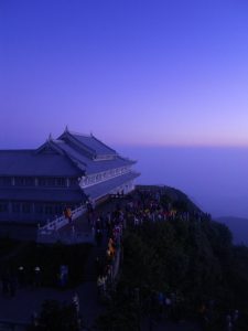 Temple roofs and forested slopes on Mount Emei in Sichuan