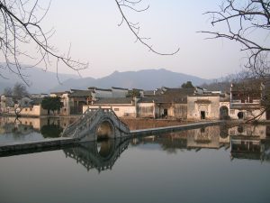 Traditional houses and water-buffalo-horn pond at Hongcun village in Anhui