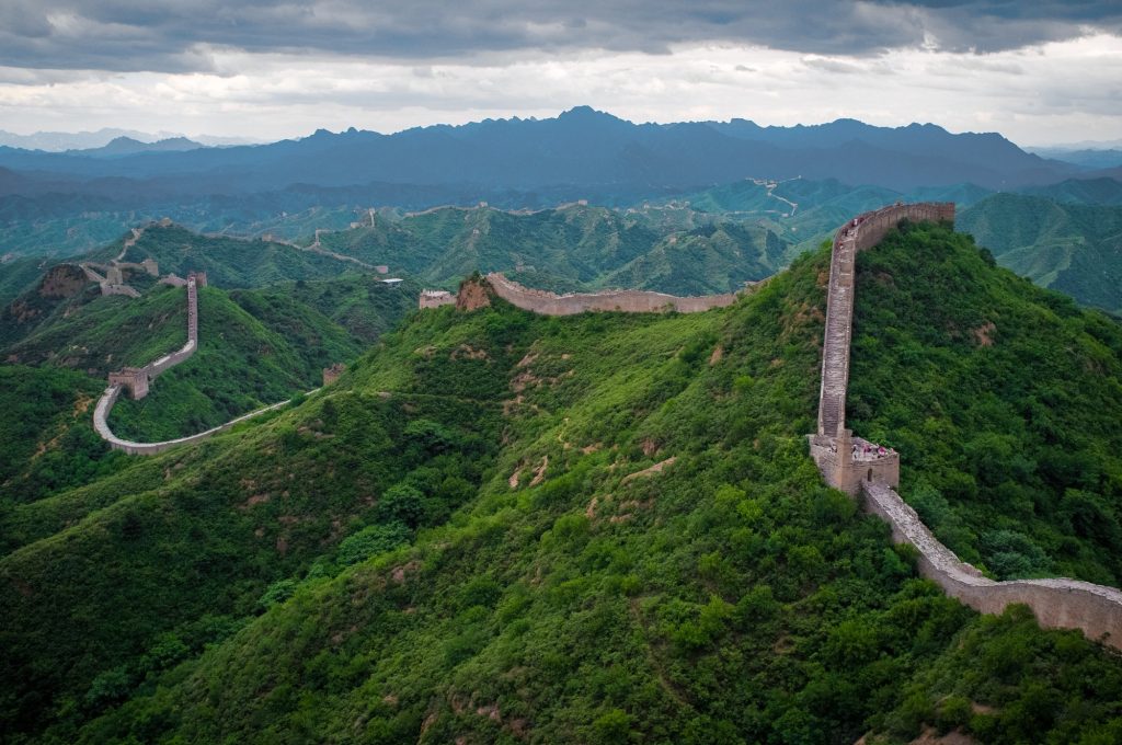 Great Wall of China watchtowers and ridgeline at Jinshanling under a blue sky
