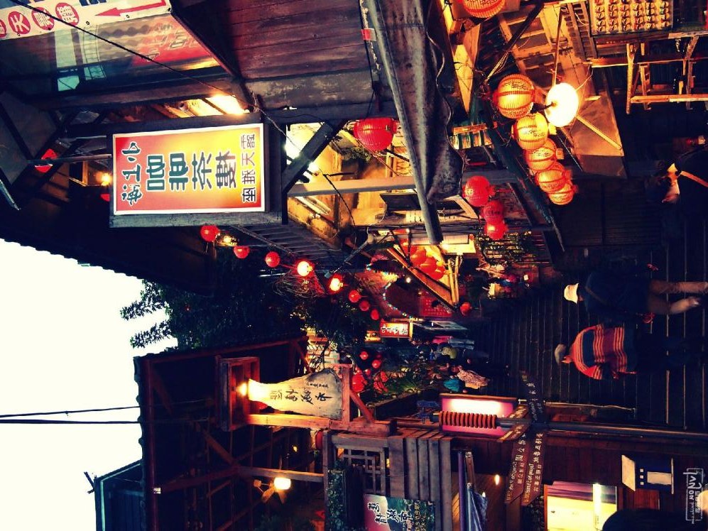 Red lanterns lighting Jiufen Old Street stairs at night near Taipei