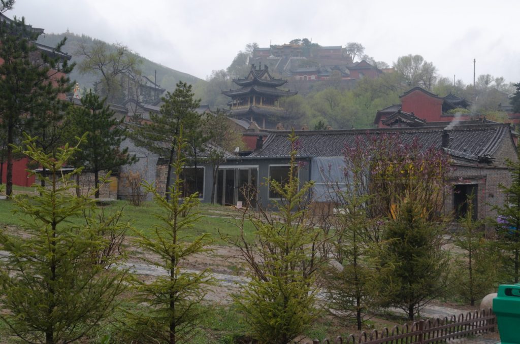 Temple roofs and hillsides at Mount Wutai in Shanxi under soft daylight