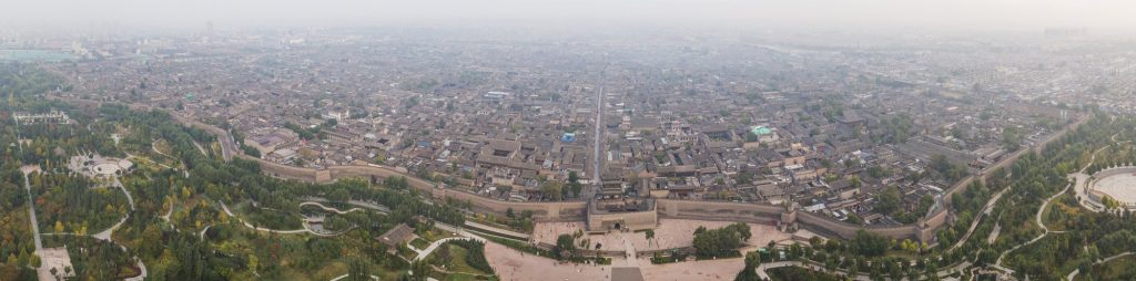 Aerial panorama of Pingyao Ancient City rooftops and walls