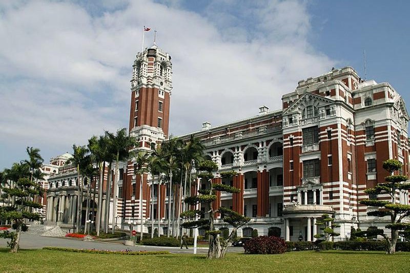 Red-brick Presidential Office Building in Taipei under blue sky