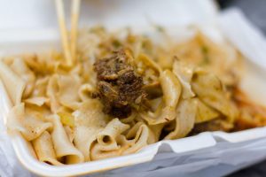 Wide biangbiang noodles with chilli oil and toppings
