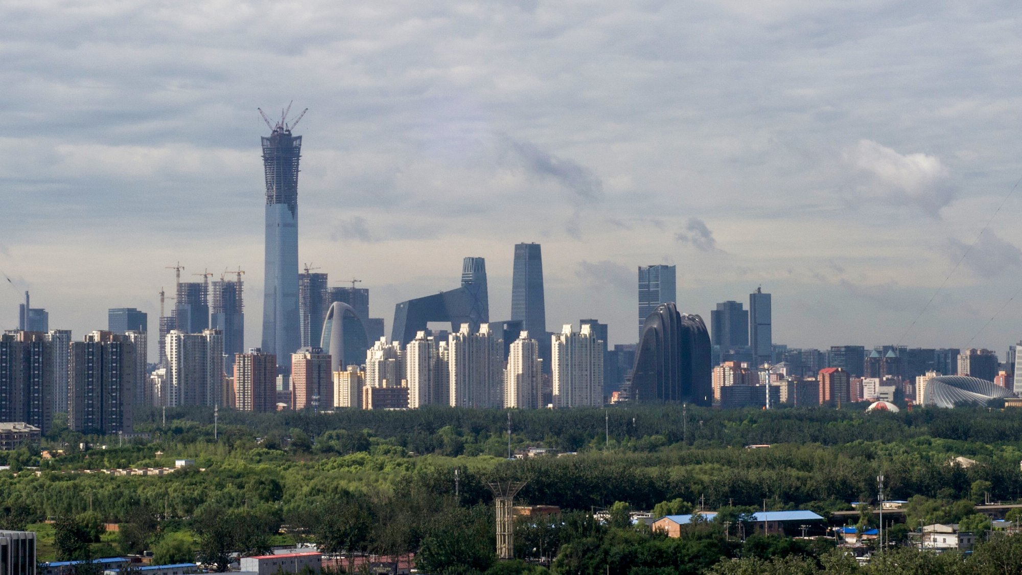 Beijing Central Business District skyline viewed from the northeast across green parkland