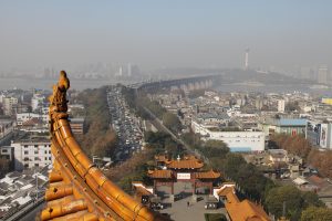 View across the Yangtze River from Yellow Crane Tower toward Wuhan bridges and hills