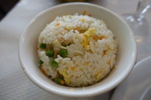 Plate of Yangzhou-style fried rice with egg and vegetables